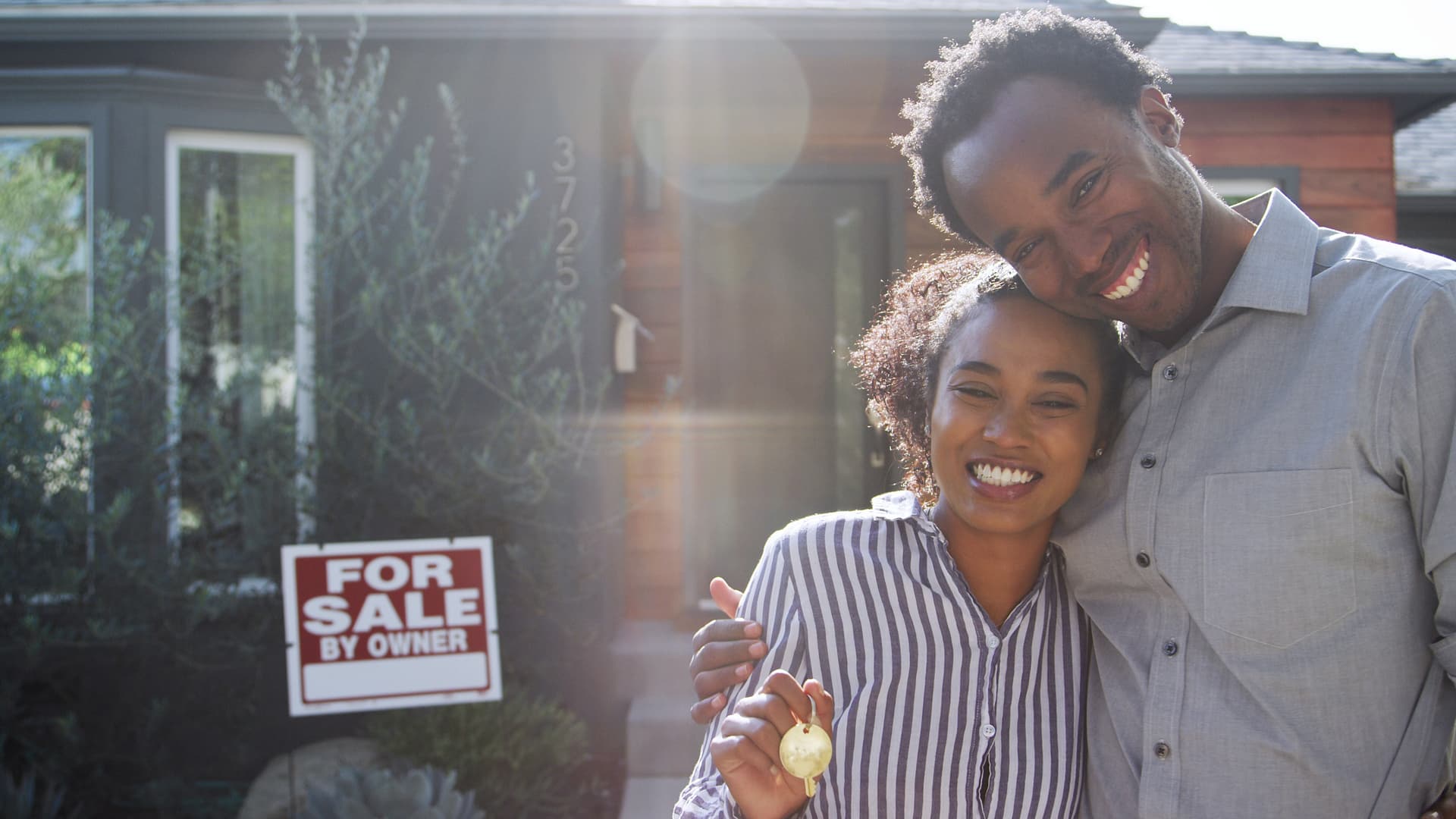 Couple viewing rental property for sale