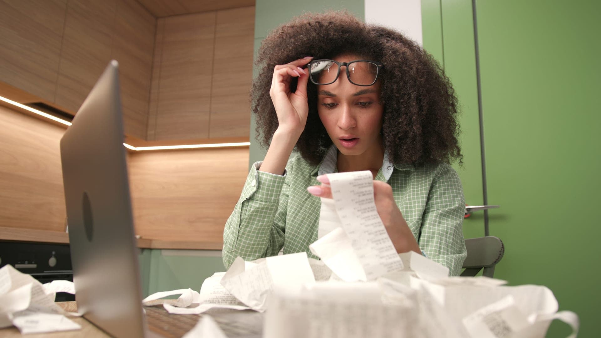 Woman accounting expenses and managing finances