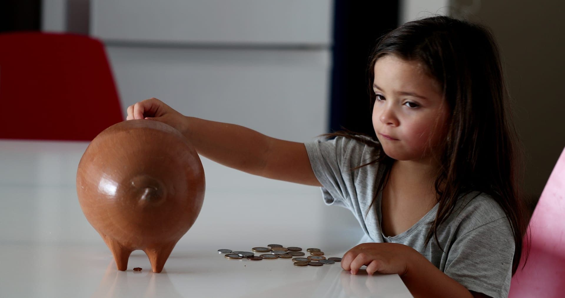 Child learning to save money